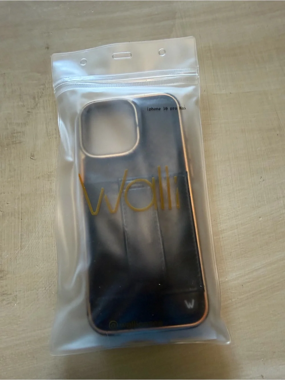 Sleek Black Wallet Phone Case with Gold Trim for iPhone 16 Pro Max